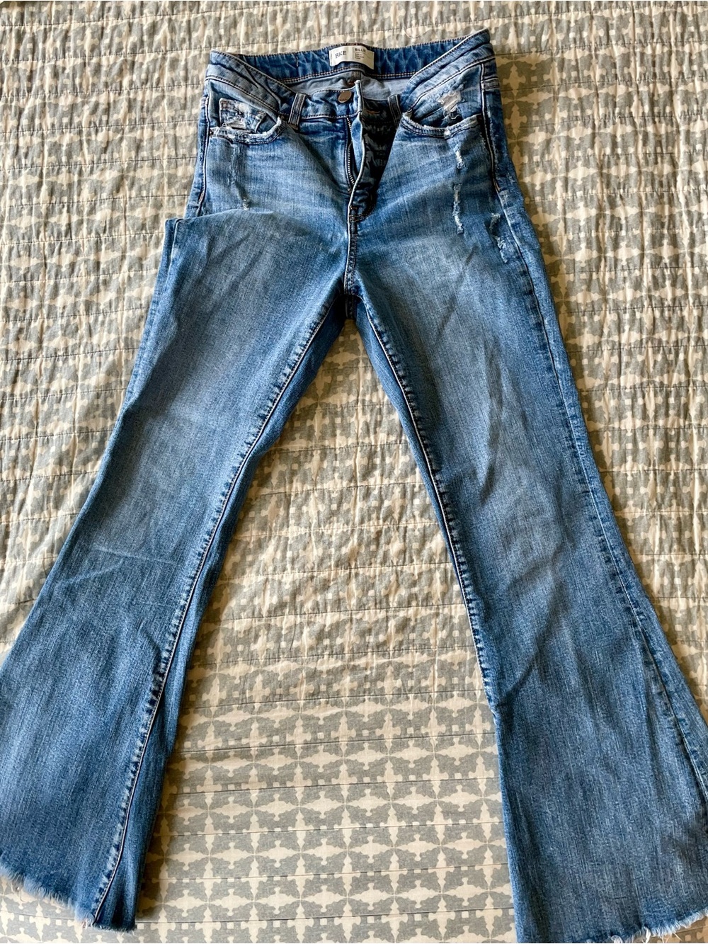 BKE Light Blue Flare Jeans with Subtle Distressing